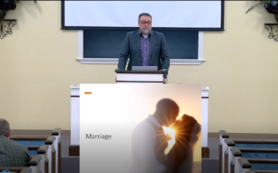 Mike Walls delivering the lesson on marriage.